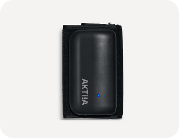 Aktiia hear rate monitor cuff on white background