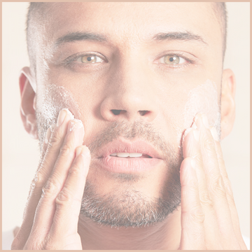 an image of a male with cleanser on his face